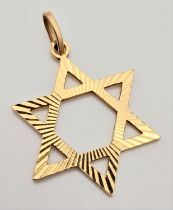 A 10K Yellow Gold Star of David Pendant. 3.5cm. 1.7g weight.