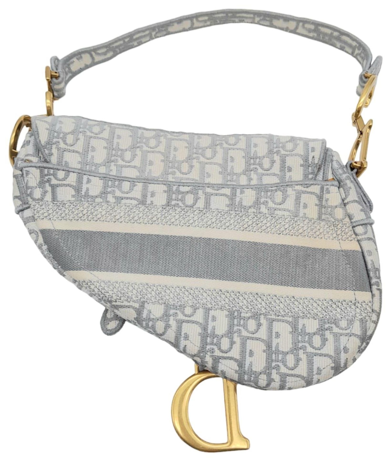 A Christian Dior Grey Saddle Bag, Gold tone hardware and Dior letter charm, comes with the - Bild 2 aus 12