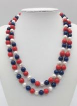 A Colourful Lapis, Coral and Cultured Pearl Matinee Length Necklace. 7/8mm pearls. 86cm necklace