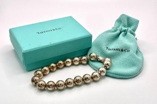 A Tiffany and Co. Ball Bracelet. Comes with Tiffany Packaging. 20cm length. Ref: 15619