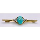 An Antique Victorian Mid-Karat Gold, Turquoise and Diamond Bar Brooch. A beautiful pale blue