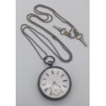An Antique Silver-Cased Pocket Watch. Birmingham hallmarks. 47mm case. Comes with keys. Works but