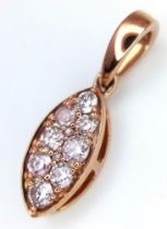 A 9K Rose Gold and Seven Pink Diamond Pendant. 1.08g total weight. 2cm.