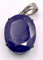 An African Blue Sapphire Pendant set in 925 Sterling silver. 26.80ct. 8.88g total weight. Comes with