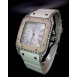 A Cartier Santos 100 Automatic Unisex Diamond Watch. White rubber Cartier strap with diamond buckle.