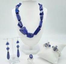 A Lapis Lazuli Nugget Necklace - 48cm, Cuff bangle, Ring - N and a pair of drop earrings - 7cm drop.