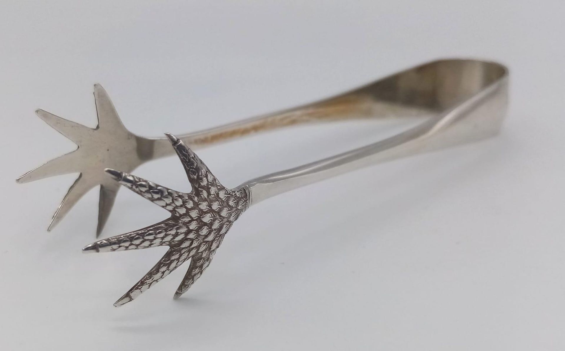 An antique sterling silver Eagle claw sugar tongs. Full hallmarks Birmingham, 1937. Total weight - Image 3 of 4
