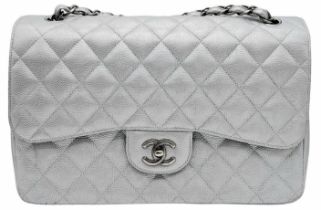 A Chanel Metallic Silver Double Flap Jumbo Bag. Quilted caviar leather. Silver tone hardware. Double