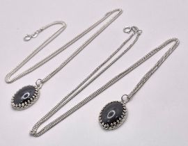 A matching set of 925 silver porcelain pendants on silver chain. Total weight 12.2G. Total length