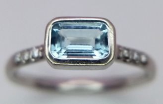 A 9K WHITE GOLD DIAMOND & AQUAMARINE RING 2G SIZE M 1/2 APPROX 0.60CT AQUAMRINE EMERALD CUT ref: