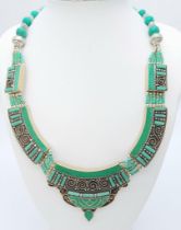 A vintage, rare and very collectable Navaho-Native American handmade necklace. Unmarked and untested
