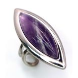 A Vintage Sterling Silver Modernist Design Amethyst Set Ring Size P (Adjustable). Set with a 3cm