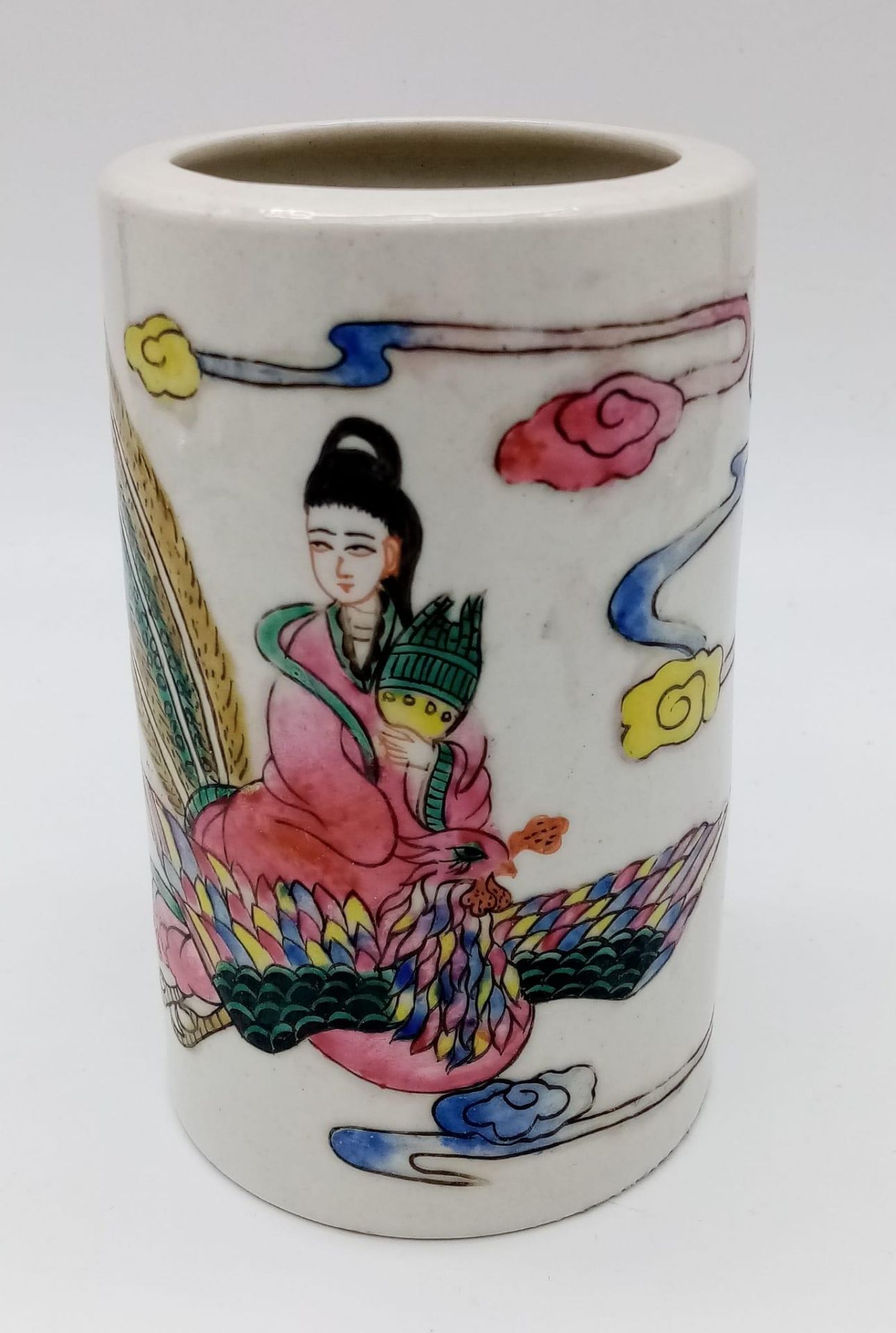 A Chinese 19th Century Famille Rose Brush Pot. Vibrant colours featuring a girl riding a phoenix and