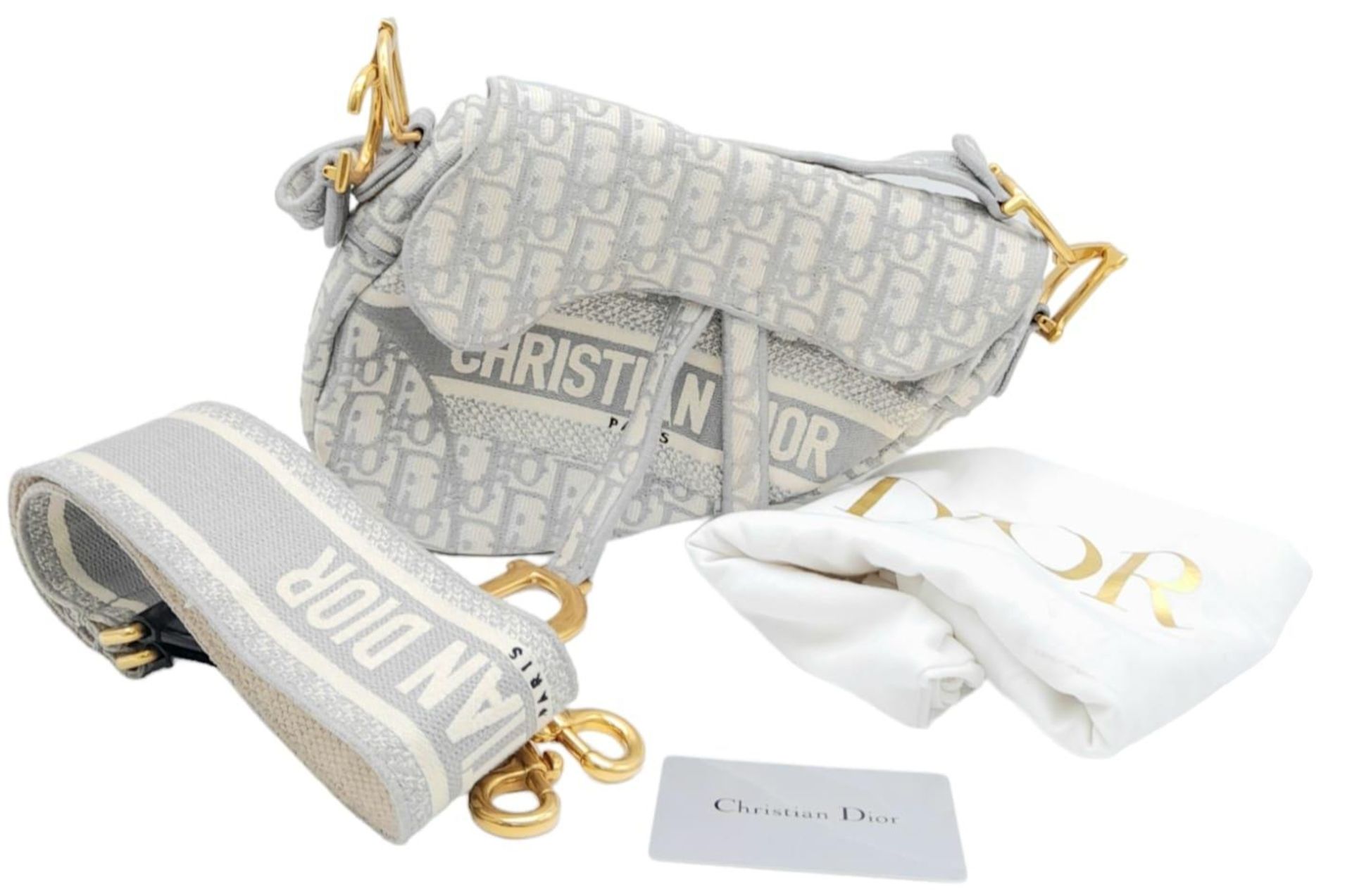 A Christian Dior Grey Saddle Bag, Gold tone hardware and Dior letter charm, comes with the - Bild 3 aus 12