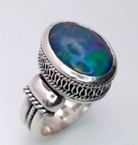 A Vintage Sterling Silver Suarti Opal Set Ring Size M. Set with a 1.3cm Oval Cut Opal in a Raised