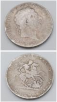 An 1820 George III Silver Crown - F grade but please see photos.