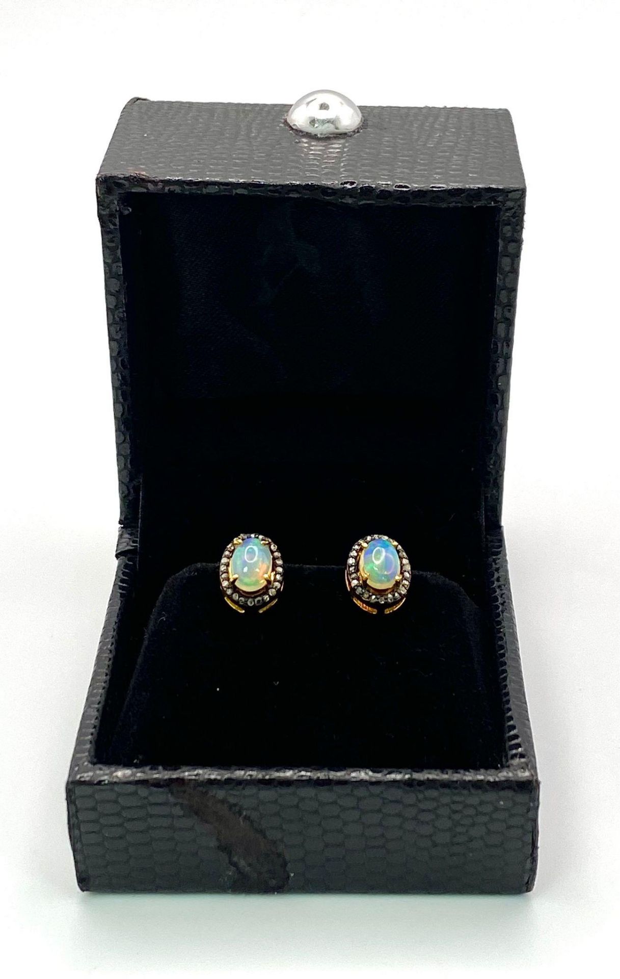 A Pair of Opal and Diamond Stud 925 Silver Earrings. Opal 2ctw and diamonds 0.35ctw. 2.73g total - Image 6 of 7