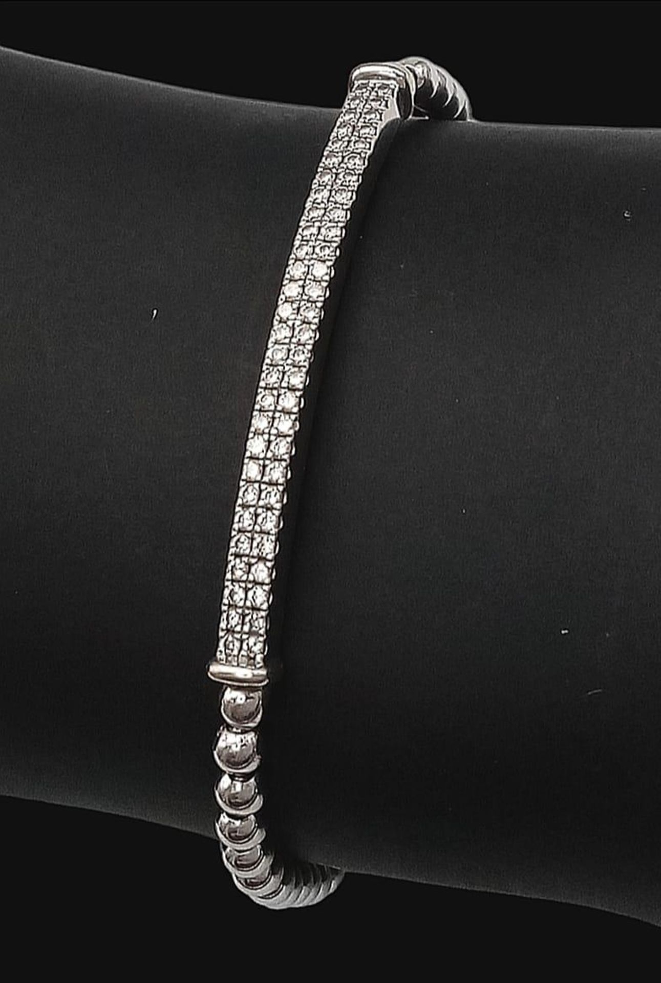 A 18K WHITE GOLD 2 ROW DIAMOND SET EXPANDABLE BRACELET 7.8G 0.60CT approx 19cm ref: 8091