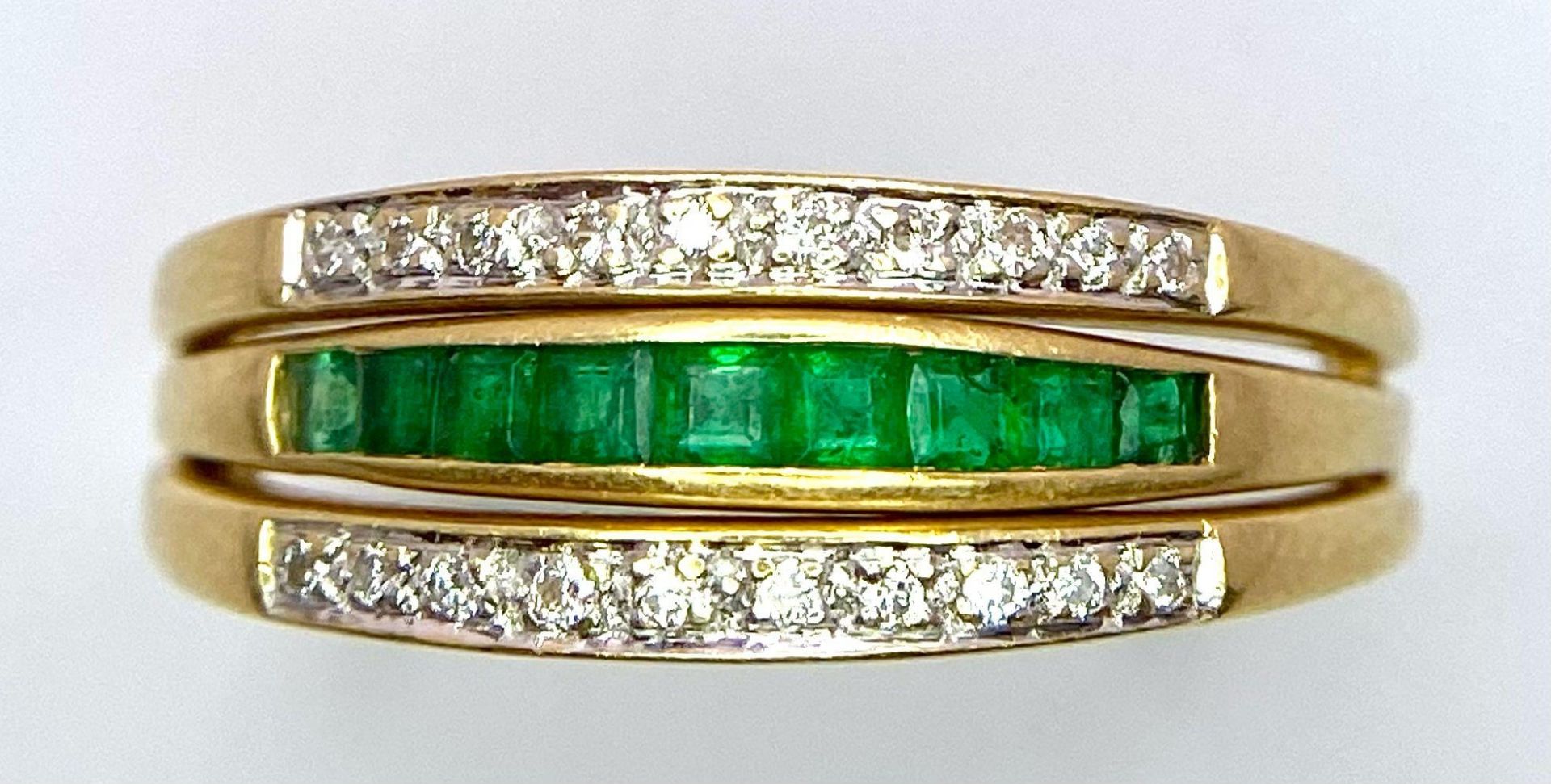 A very interesting 18 K yellow gold ring with two emerald bars and two rotating diamond bars that - Image 12 of 13
