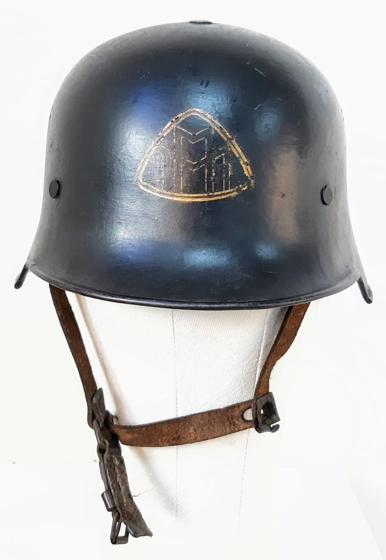 An Unknown WW2 German Factory Fire Fighters Helmet and liner.