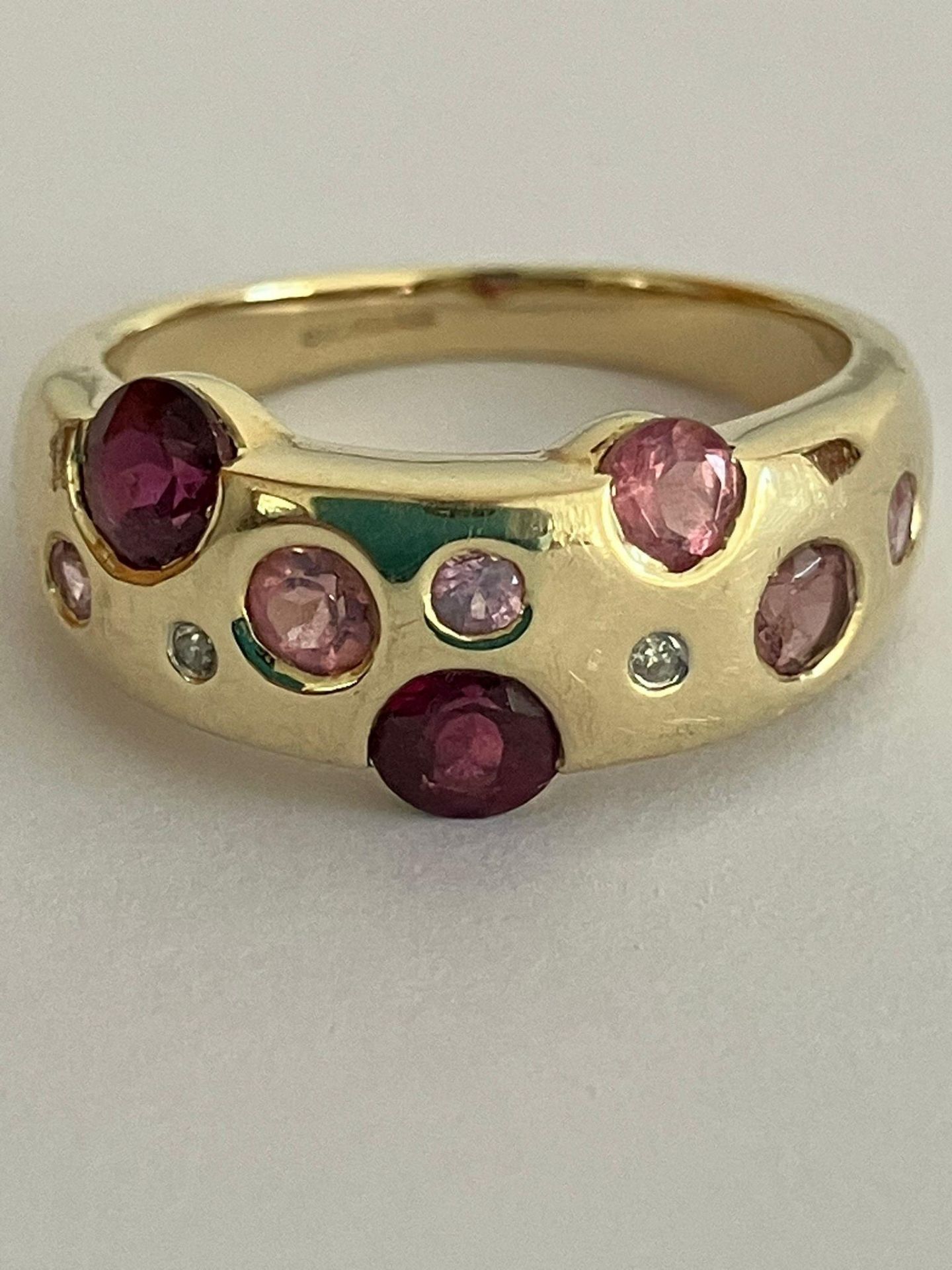 Hallmarked 9 carat GOLD RING set with Multi gemstones to include DIAMONDS. Complete with ring box.