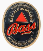 A Vintage Enamel on Metal Oval Bass Sign - Bass Ale on Draught. 36x 46cm.