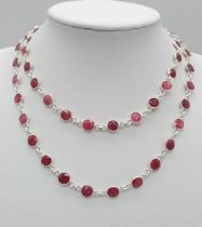 A Ruby Gemstone Matinee Length Necklace. Circle cut gemstones set in 925 Silver. 21.21g total