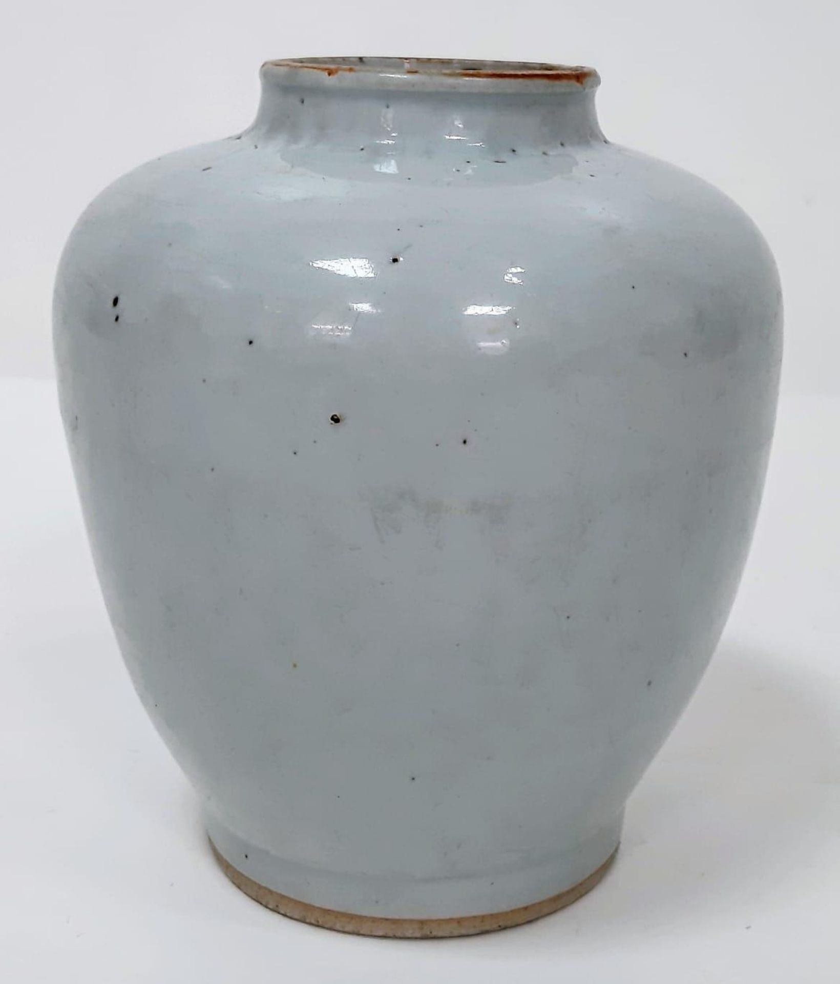 A 14th Century Chinese Vase. Traditional to the time, the lines and curves of this vase are