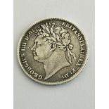 1824 GEORGE IV SILVER SHILLING. Overall condition fine or better, with clear detail to both sides.