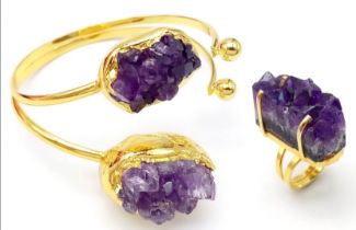 A uniquely created, heavily gilded, bangle and ring set with a large natural bouquet of amethyst