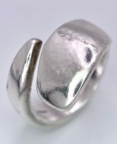 Sterling Silver Fancy Twist Crossover Ring. Hallmark indicates London and makers mark TS. Size: Q