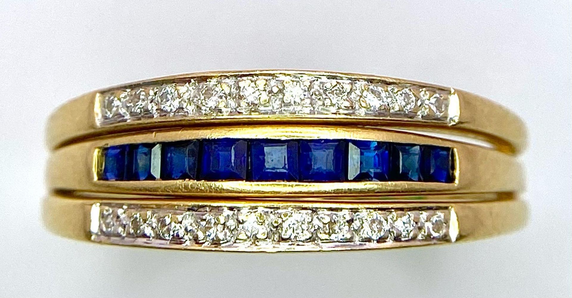 A very interesting 18 K yellow gold ring with two emerald bars and two rotating diamond bars that - Image 11 of 13
