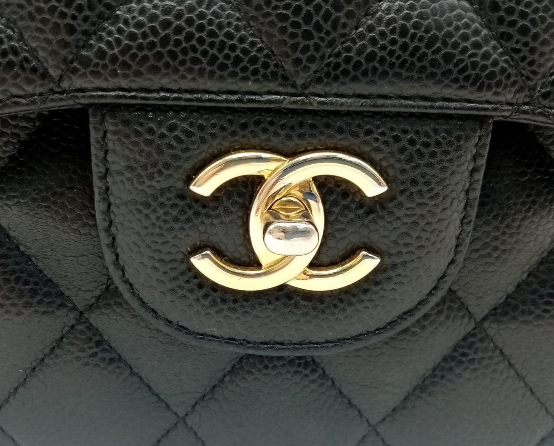 A Chanel Black Caviar Classic Double Flap Bag. Quilted pebbled leather exterior with gold-toned - Image 10 of 11