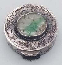 A Jade and Silver Small Circular Pill Box. Circa 1930s. 32mm diameter.