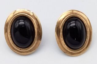 A Pair of Vintage 9K Yellow Gold and Onyx Oval Earrings. 2.92g total weight.