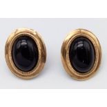 A Pair of Vintage 9K Yellow Gold and Onyx Oval Earrings. 2.92g total weight.