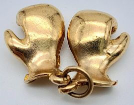 A 9K YELLOW GOLD SOLID BOXING GLOVE CHARMS. TOTAL WEIGHT 4.3G