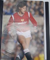 AN ALBUM OF 40 SIGNED 12"X 8" MANCHESTER UNITED PLAYERS PHOTOS INCLDING SHERINGHAM , GIGGS , NEVILLE