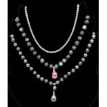 A trio of 925 Silver, beaded necklaces. 1) Black stone beaded, 925 clasp, with pink stone pendant (