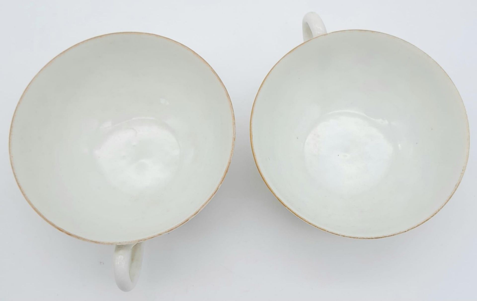 A pair of antique Japanese, hand-painted cup and saucer. Fine bone china with a delightful floral - Image 5 of 9