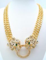 An impressive necklace with two panther heads in the style of French designers. In a quality