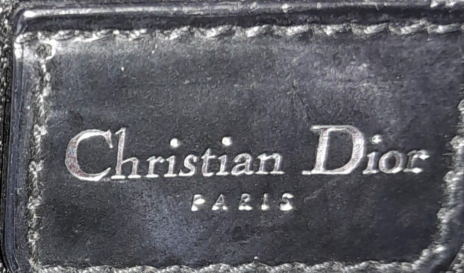 A Christian Dior - Lady Dior Bag. Canvas and black patent leather exterior. Silver tone hardware. - Image 7 of 9
