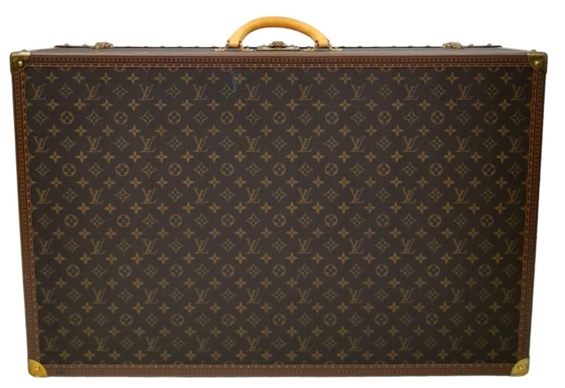 A Louis Vuitton Alzer 80 Monogram Large Sturdy Suitcase/Trunk. Monogram canvas and brown leather - Image 3 of 11