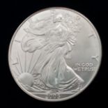 1 OZ FINE SILVER ONE DOLLAR COIN DATED 2005. SIZE: 5CM WEIGHT: 31.3G