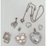 A collection of Seven Silver Pendants and a lovely Silver Necklace. Pendants: Good mix of love