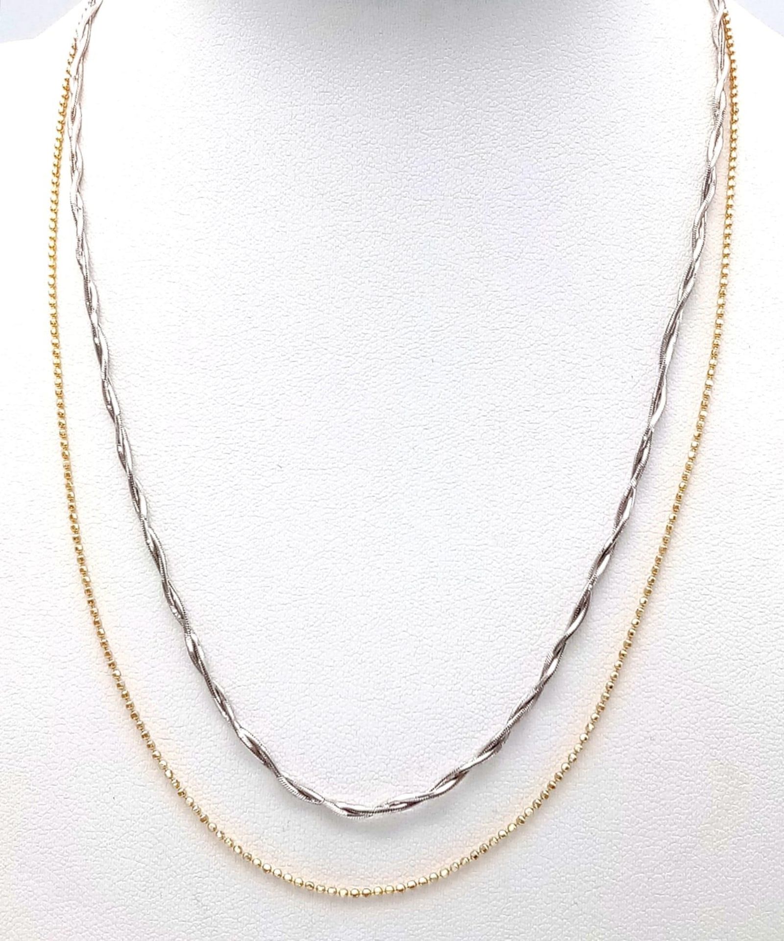 An Interesting 14K Yellow and White Gold Two Row Necklace. Yellow ball-links and a white twist