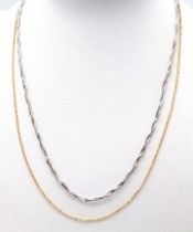 An Interesting 14K Yellow and White Gold Two Row Necklace. Yellow ball-links and a white twist