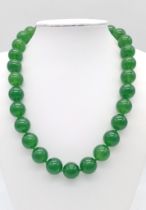 A Large Green Jade Bead Necklace. 14mm Beads. 42cm necklace length.