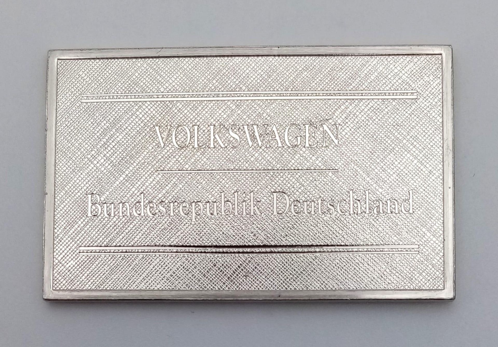 A STERLING SILVER V W VOLKSWAGON SYMBOL PLAQUE 23.2G 45mm x 29mm ref: 8128 - Image 3 of 4