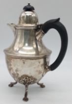 An antique sterling silver coffee pot. Come with full hallmarks Sheffield, 1907. Total weight 382.